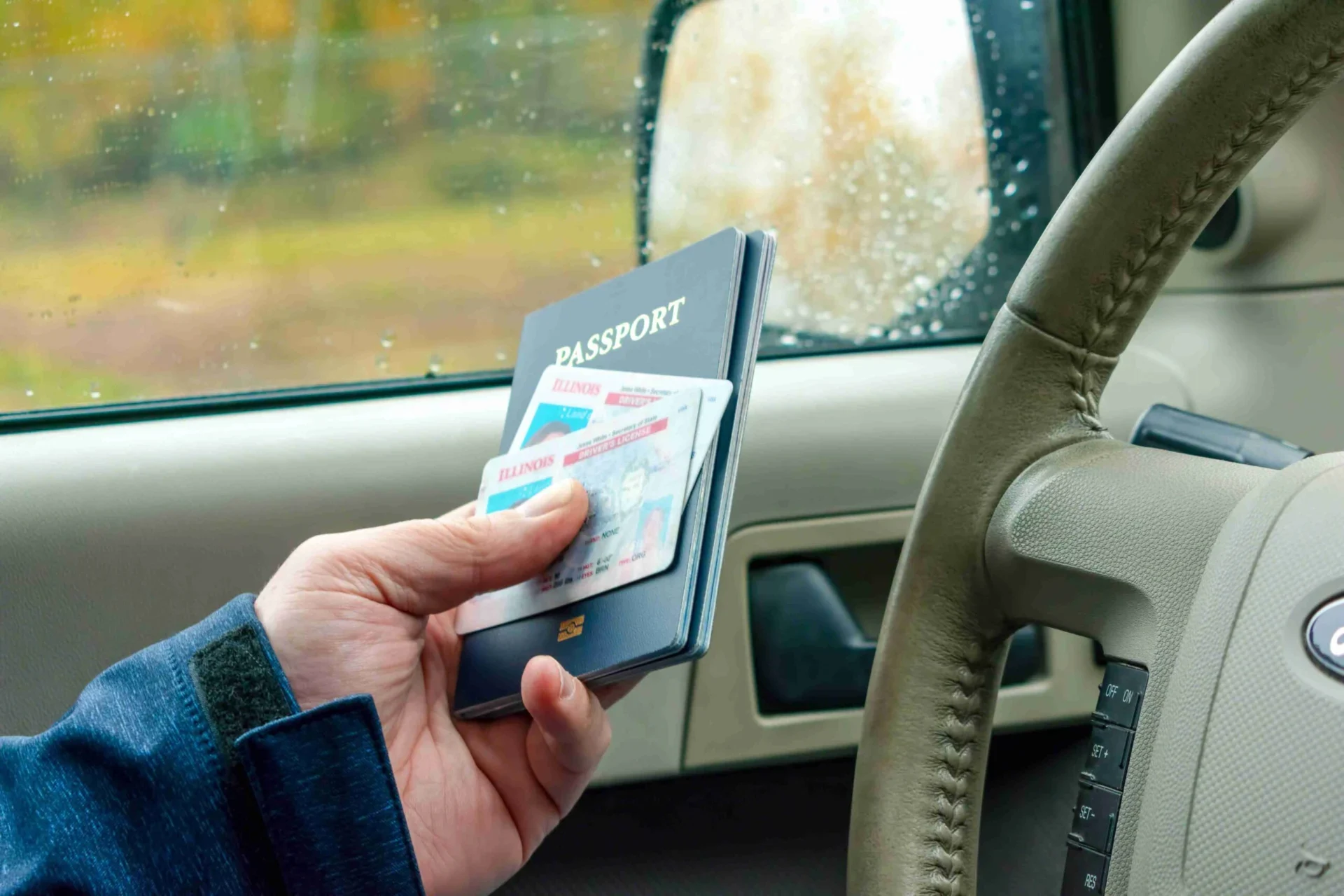 man in car providing passport and identification a 2023 11 27 05 33 30 u WfM6U9t scaled