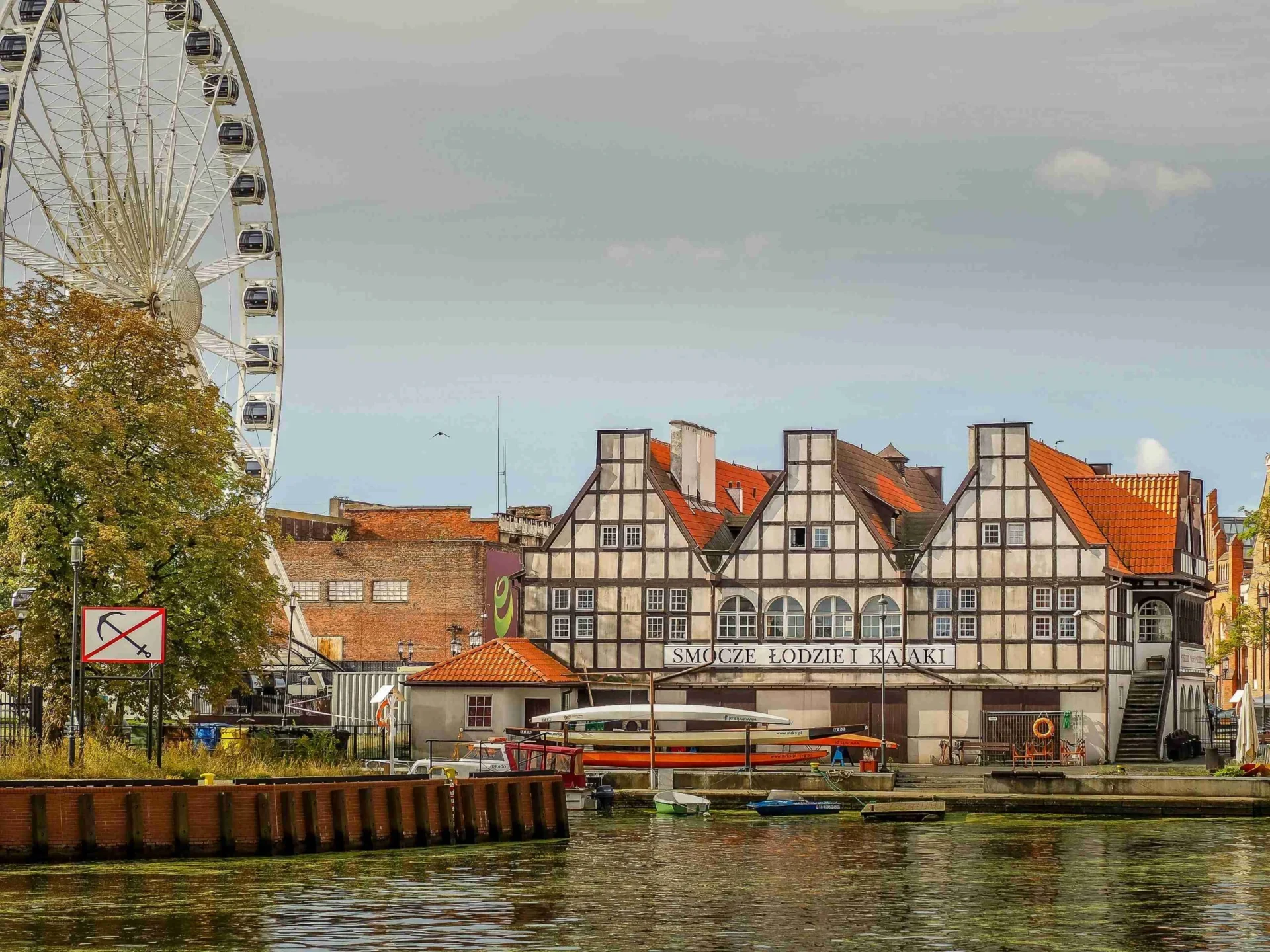 Canal View of Historic Gabled Buildings at Dusk