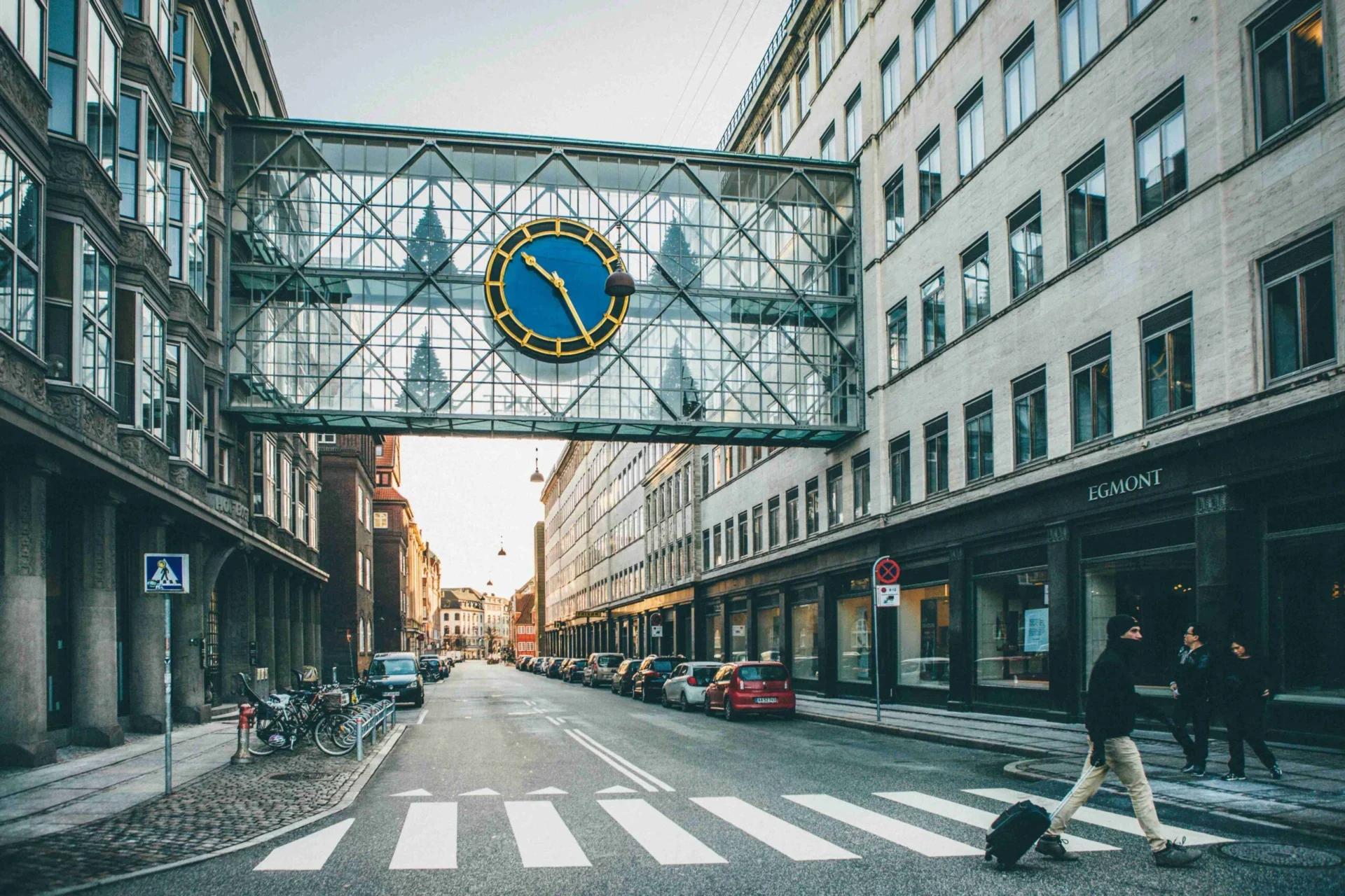 Bustling City Intersection with Cyclists and Historic Architecture