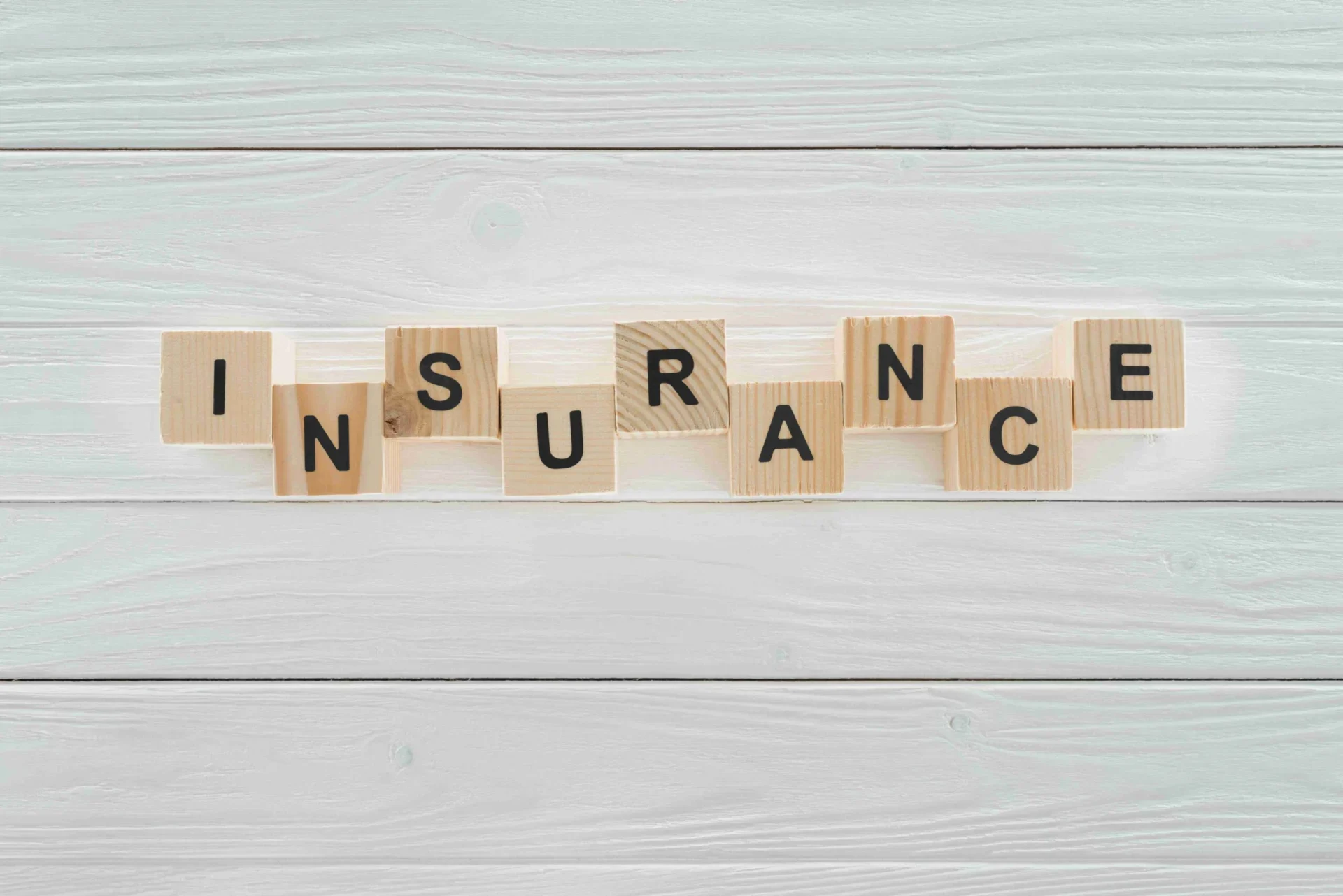 car-and-pen-on-insurance-documents-car-insurance